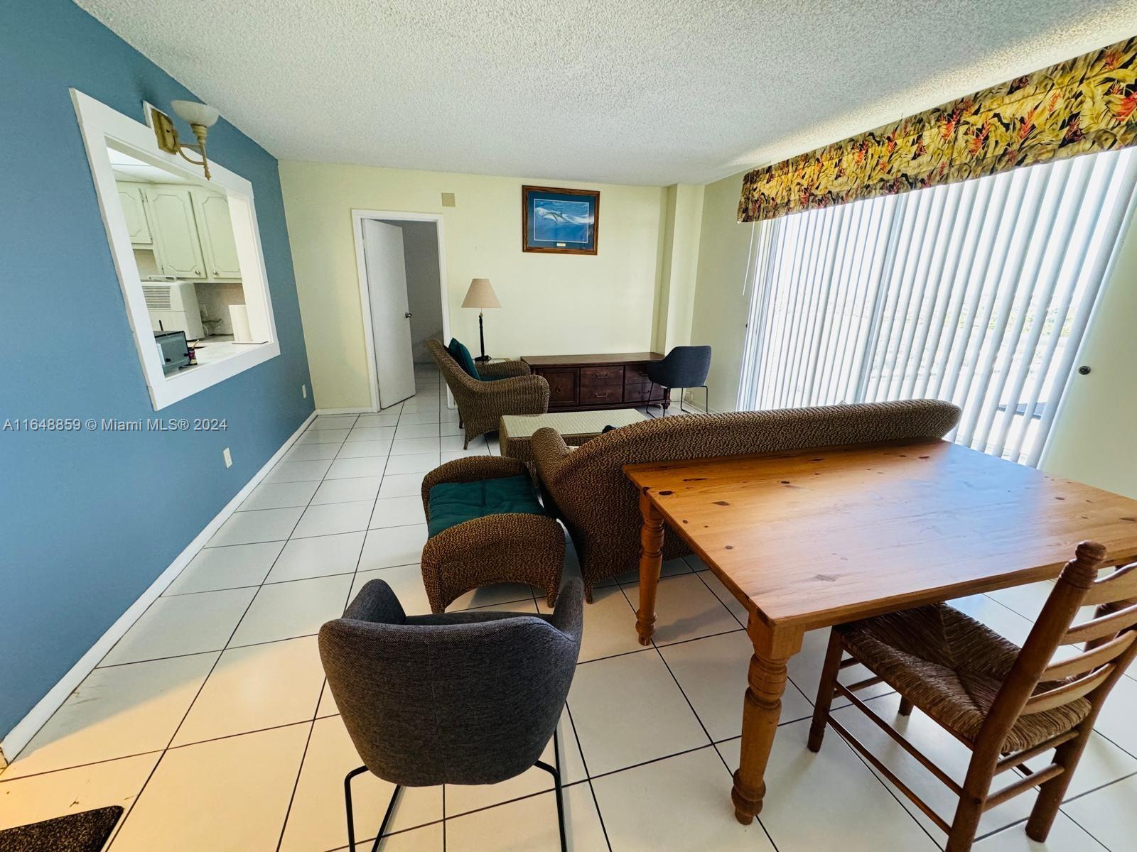 a living room with a couch and a table