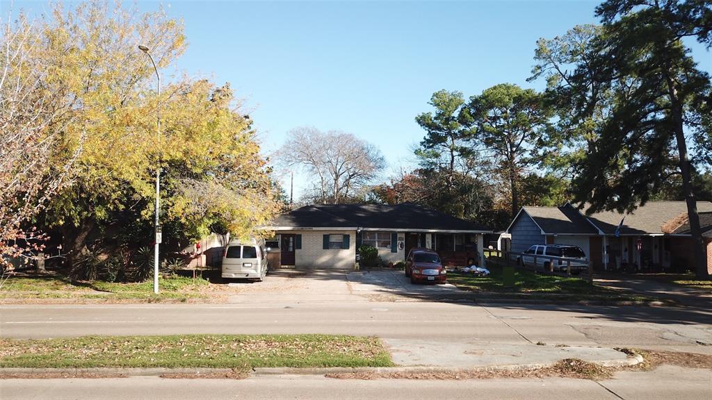 a view of house with outdoor space and street view