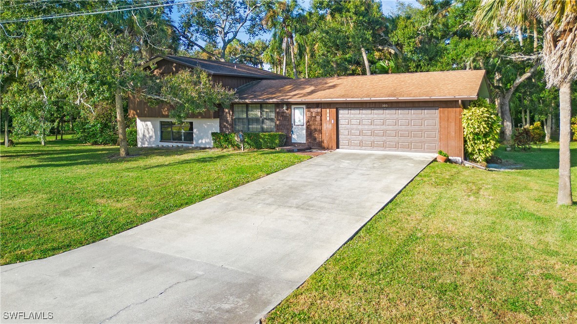 front view of a house with a yard