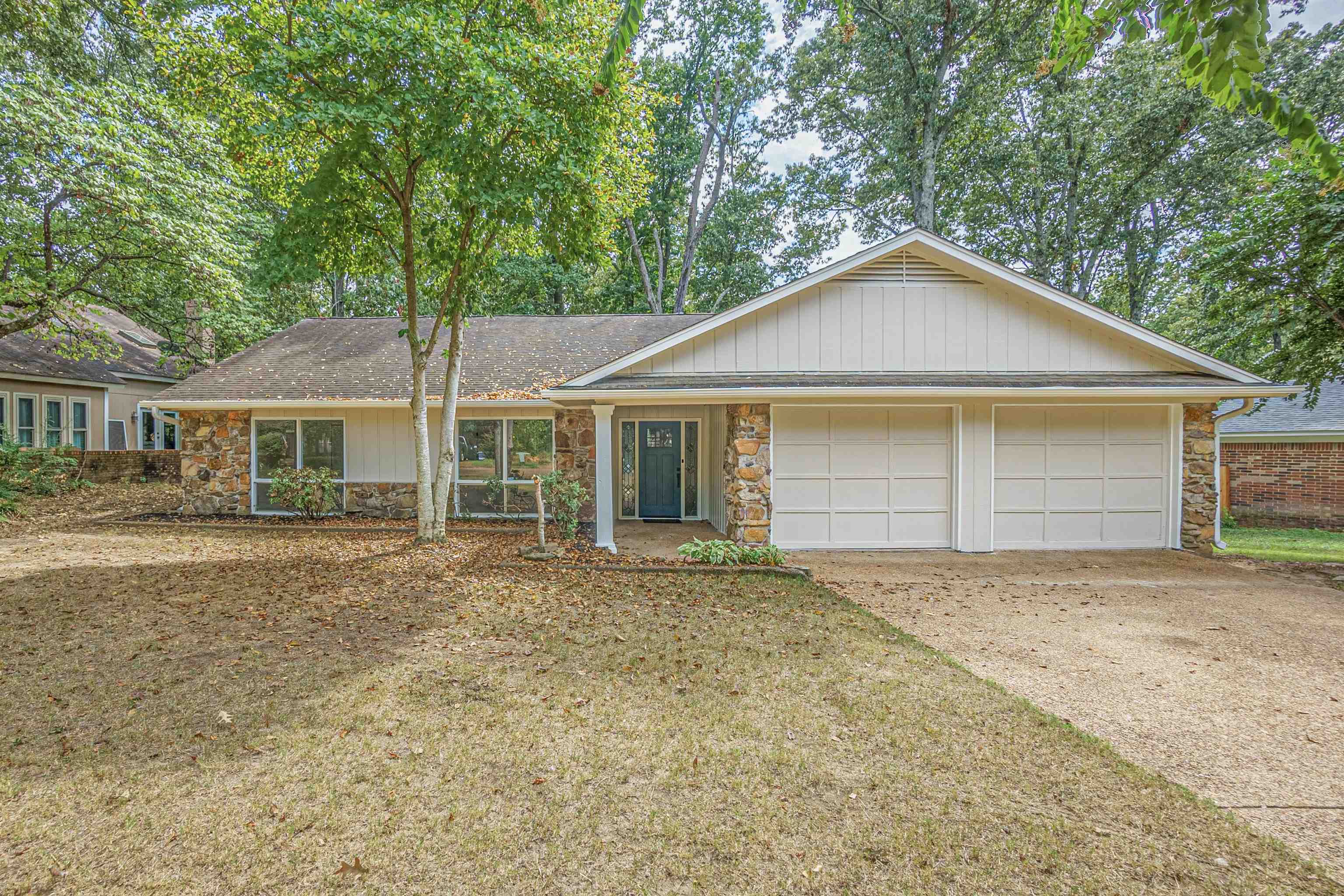 Ranch-style home featuring a garage