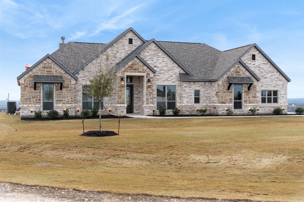 a front view of a house with a porch