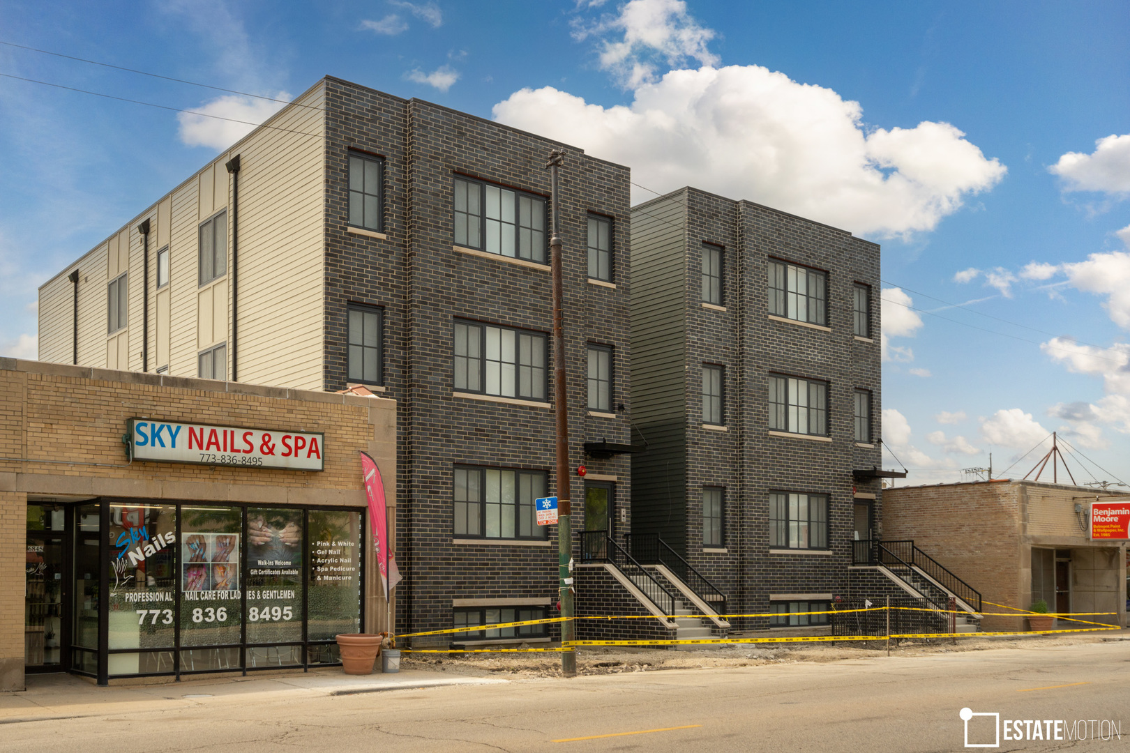 a front view of a building with street