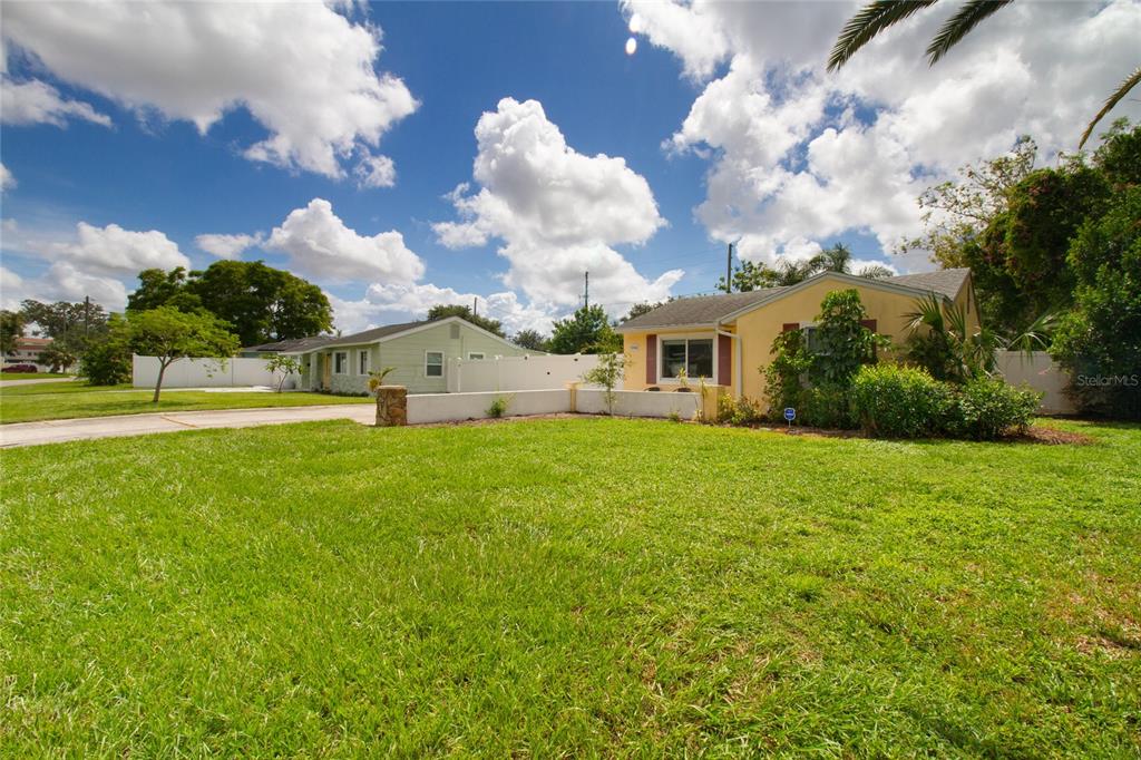 a view of a house with a big yard