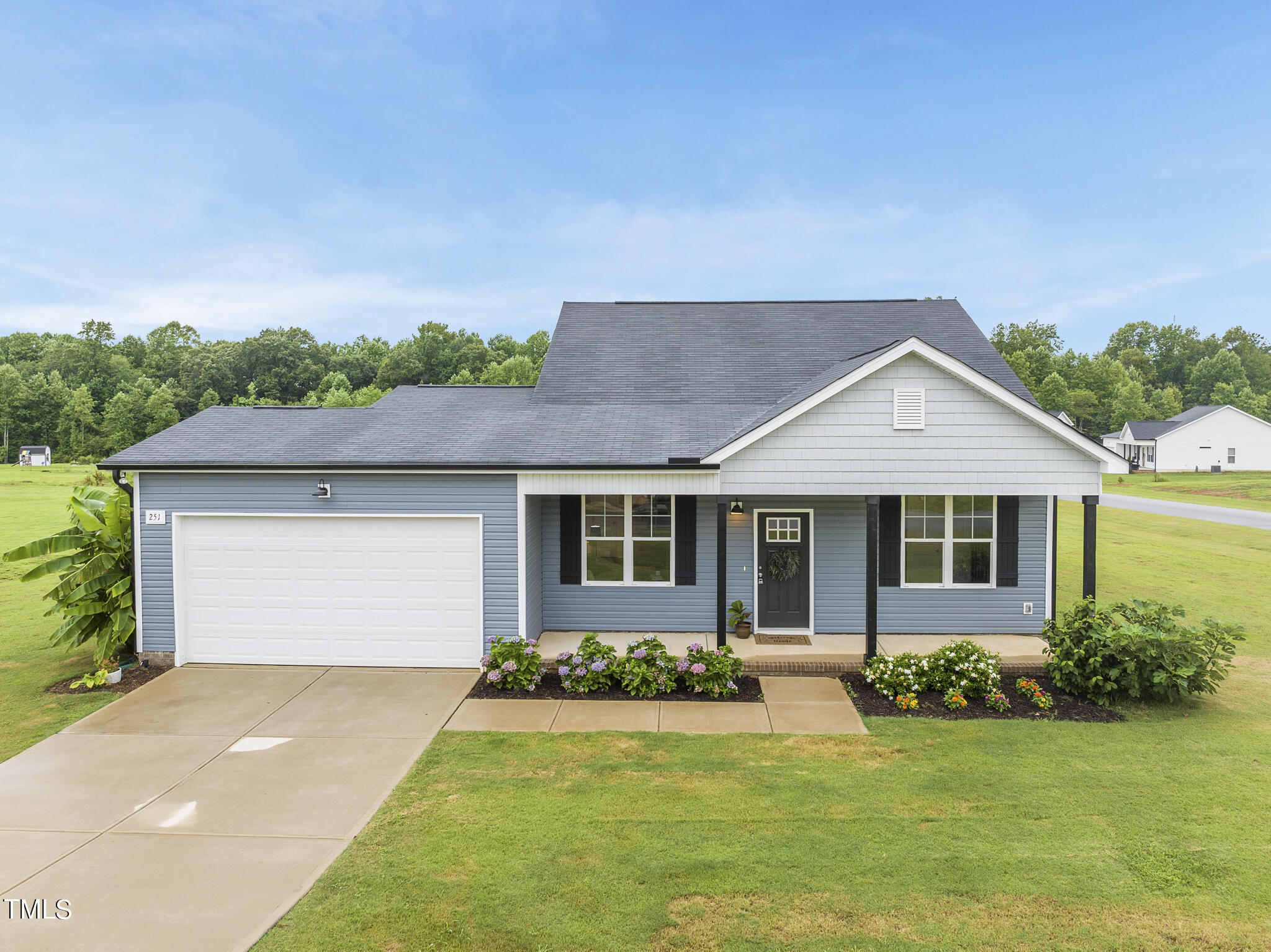 front view of a house and a yard