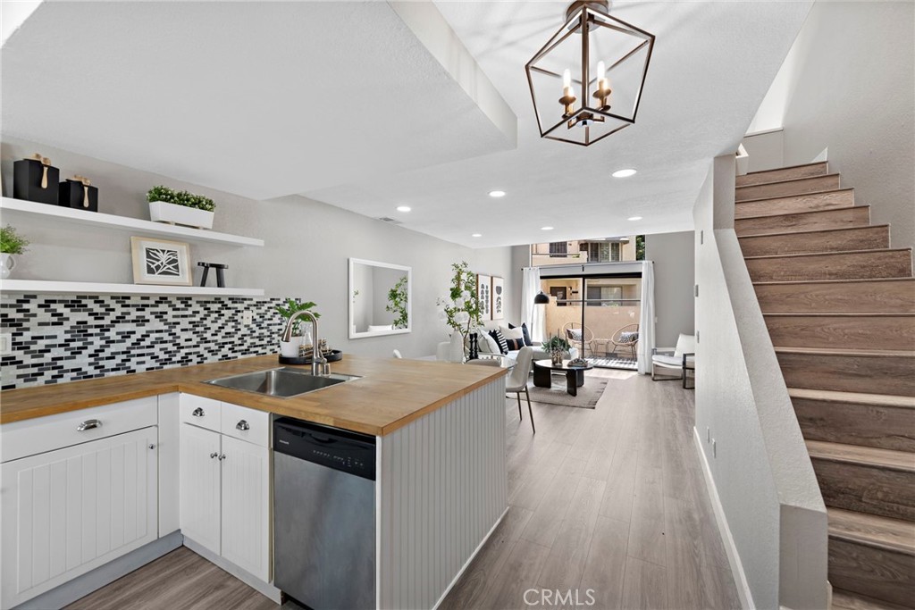 a kitchen with sink cabinets and counter top space