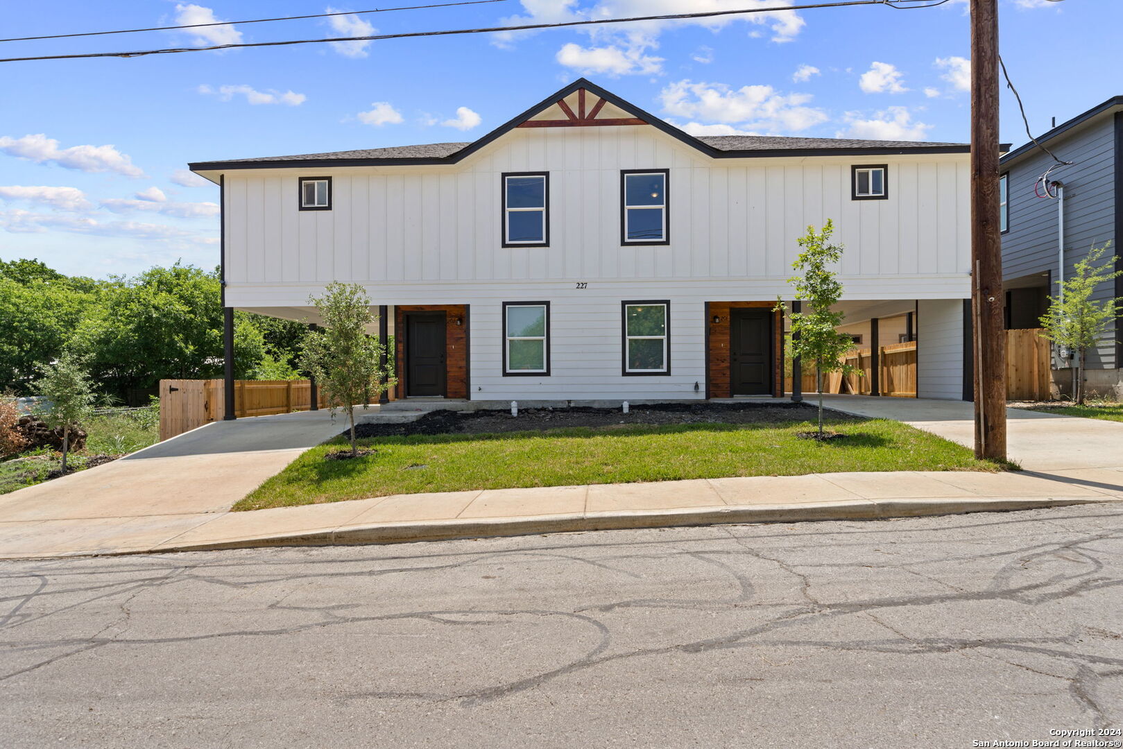 a view of front of house with a yard