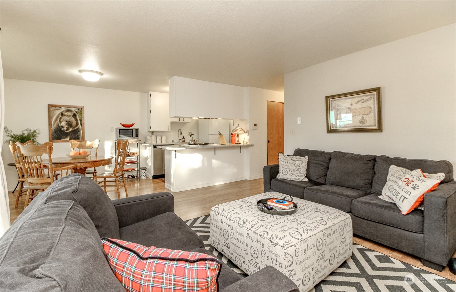 a living room with furniture and a table