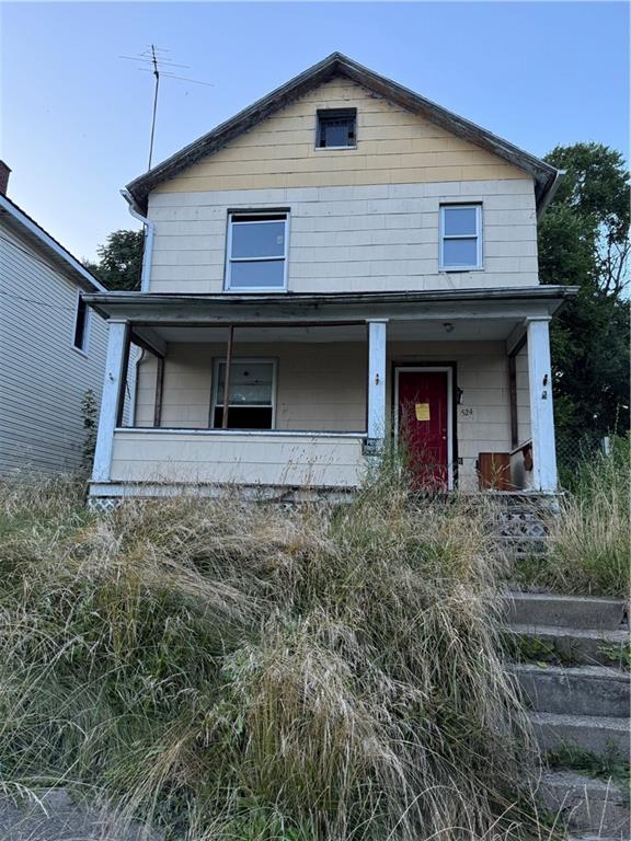 a front view of a house with garage