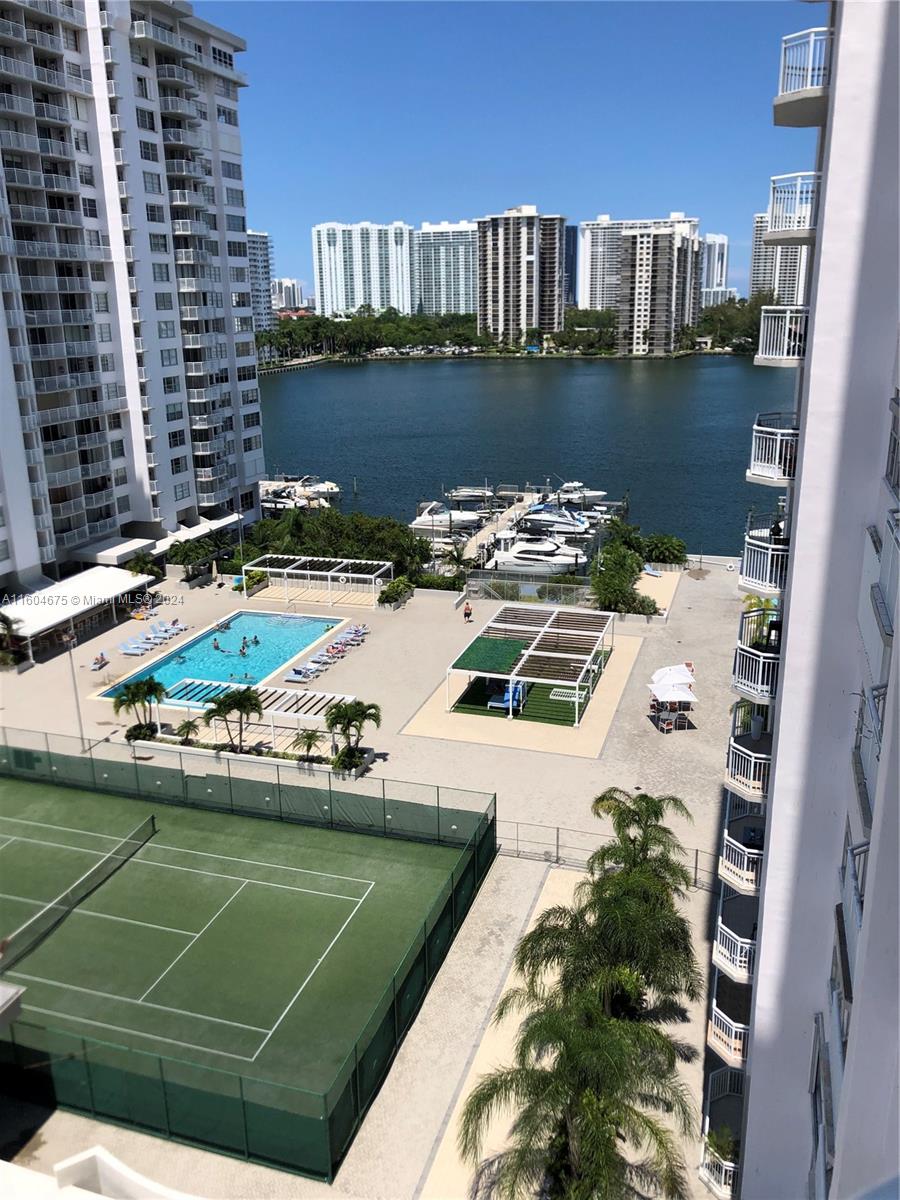 a view of a lake yard and a balcony