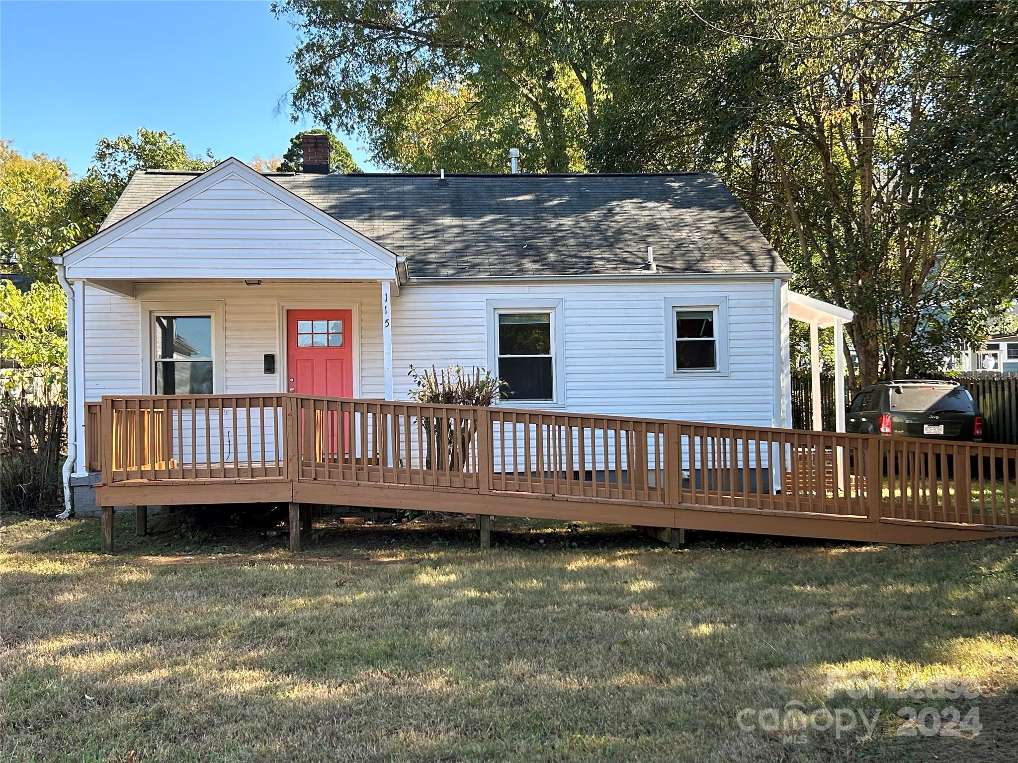 a view of a house with a deck