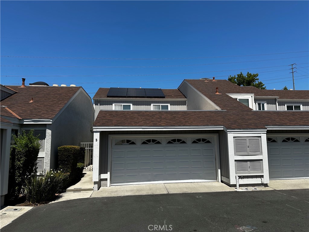 a front view of a house with yard