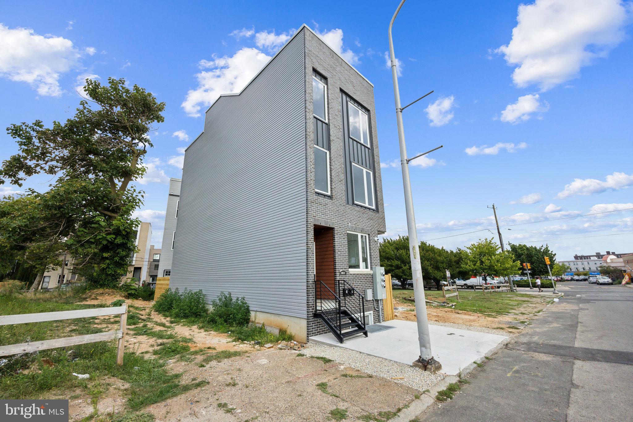 a view of a building with a yard