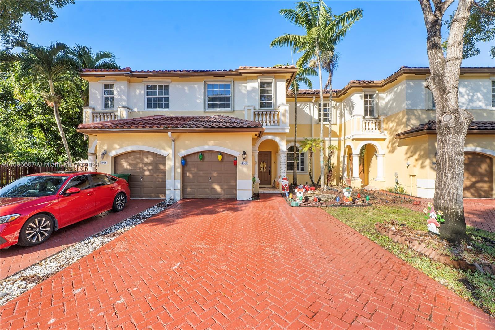 a view of a house with outdoor space and parking