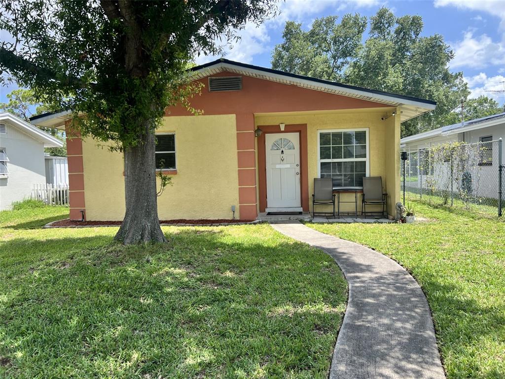 front view of a house with a yard