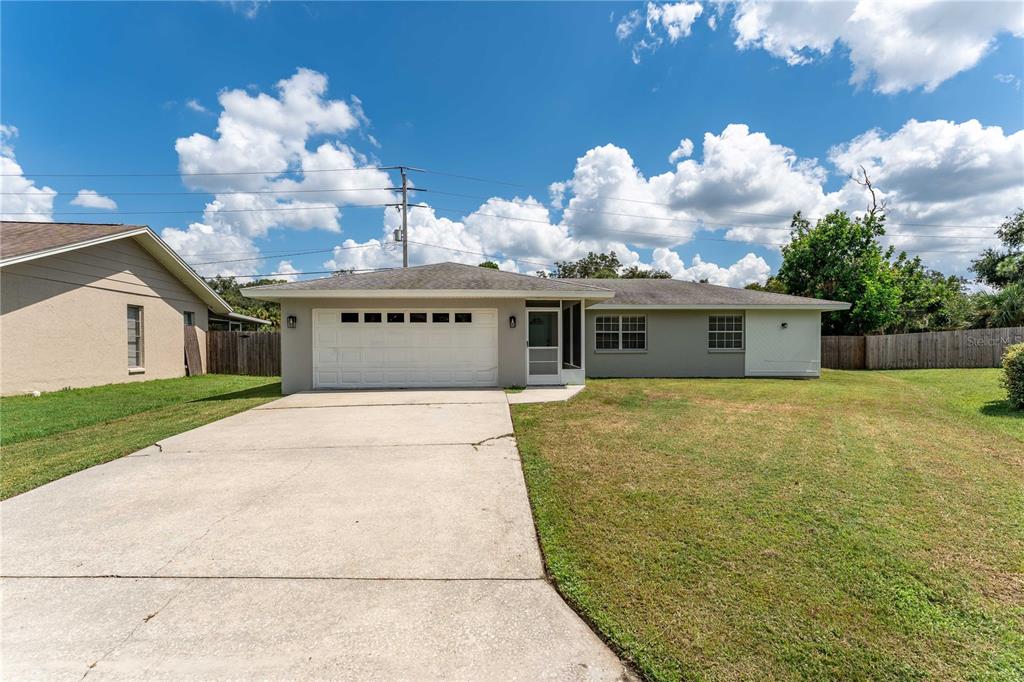 a front view of house with yard