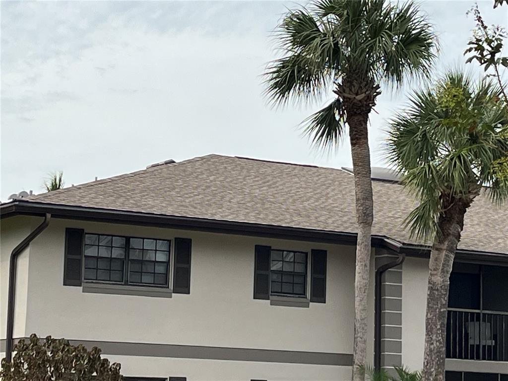 a front view of a house with a garage