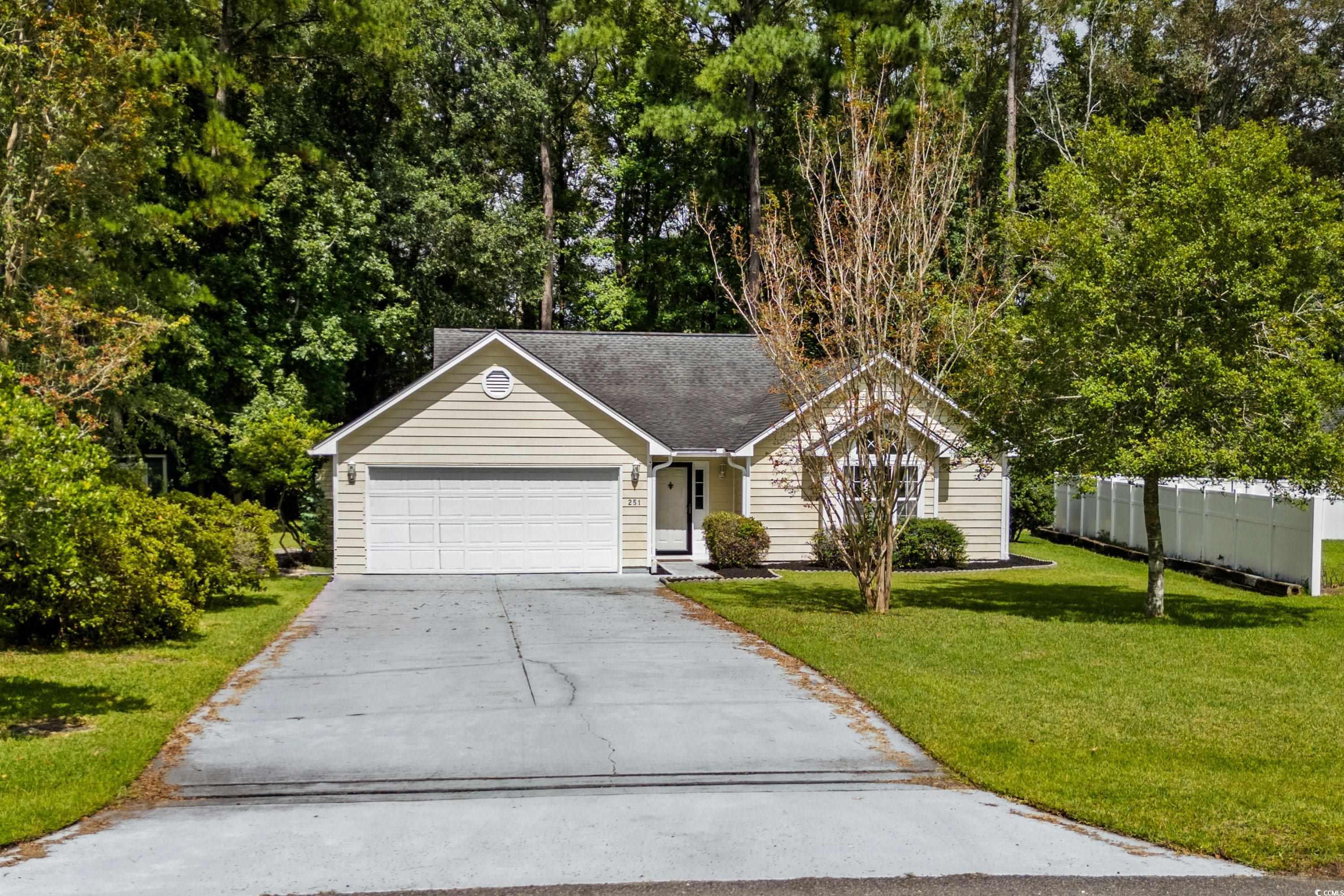 View of front of property with a front lawn and a