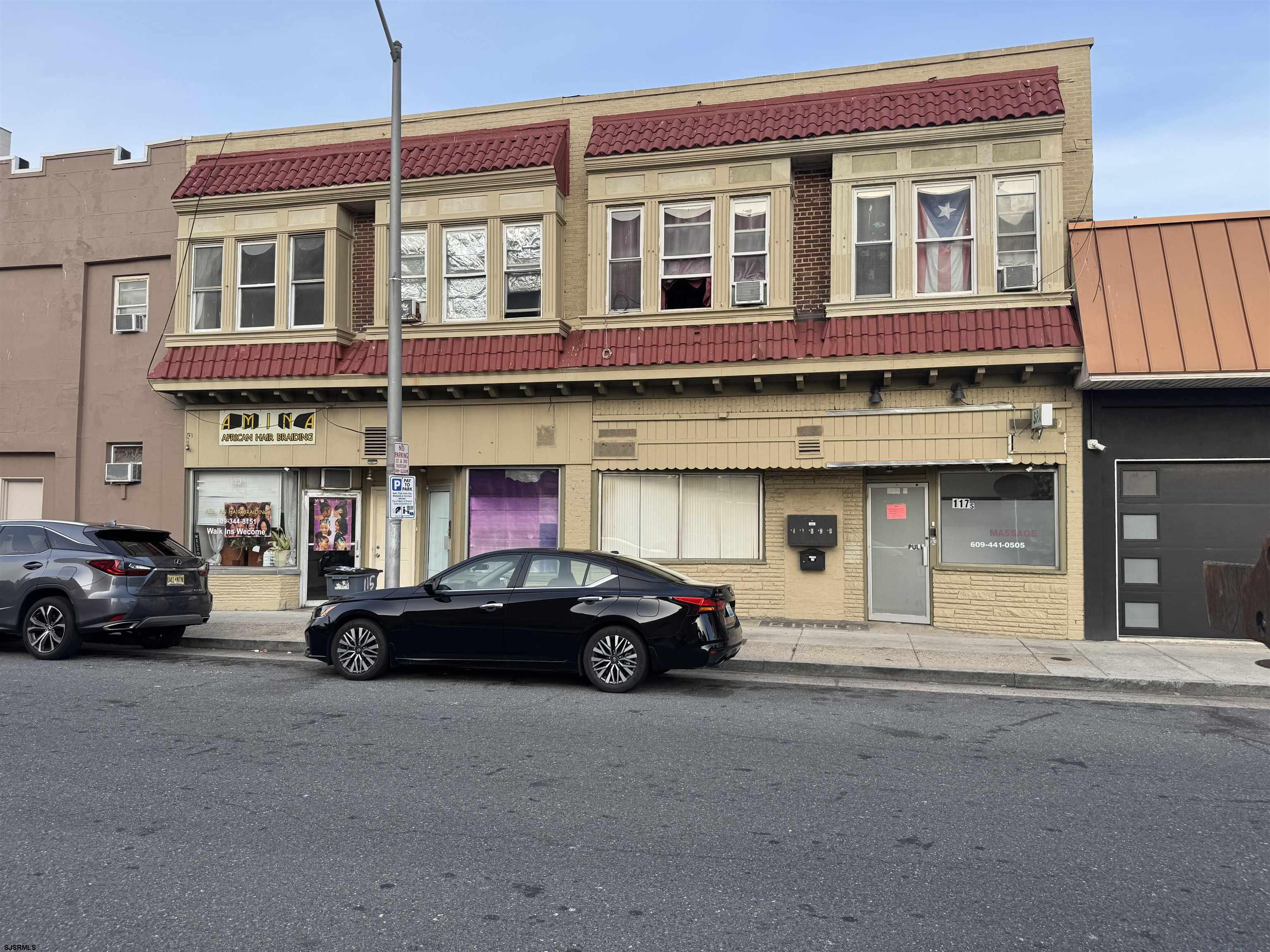 a car parked in front of a building