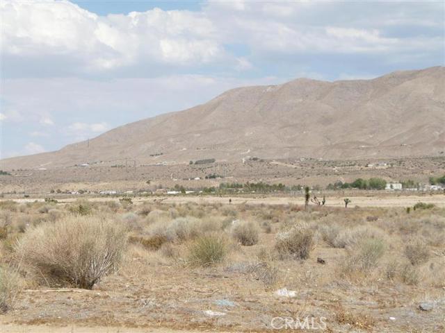 a view of ocean and mountains