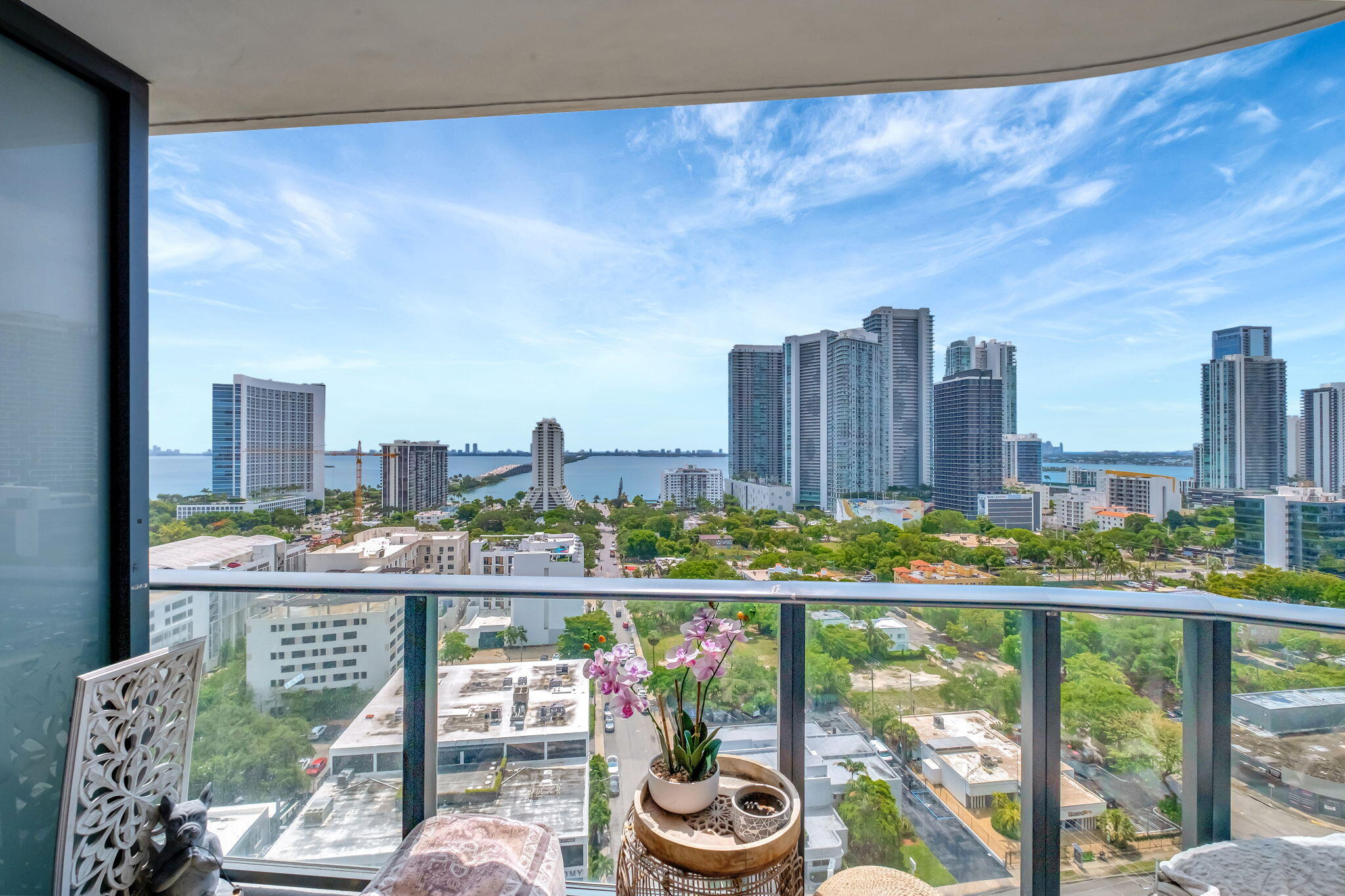 a view of a balcony with city view