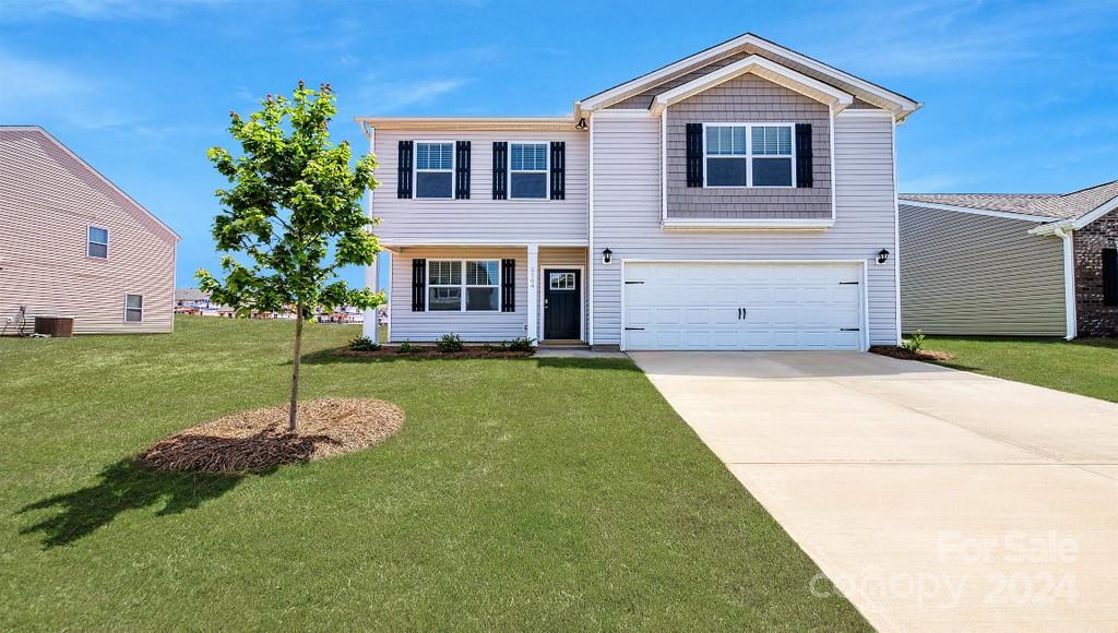 a house with garden in front of it