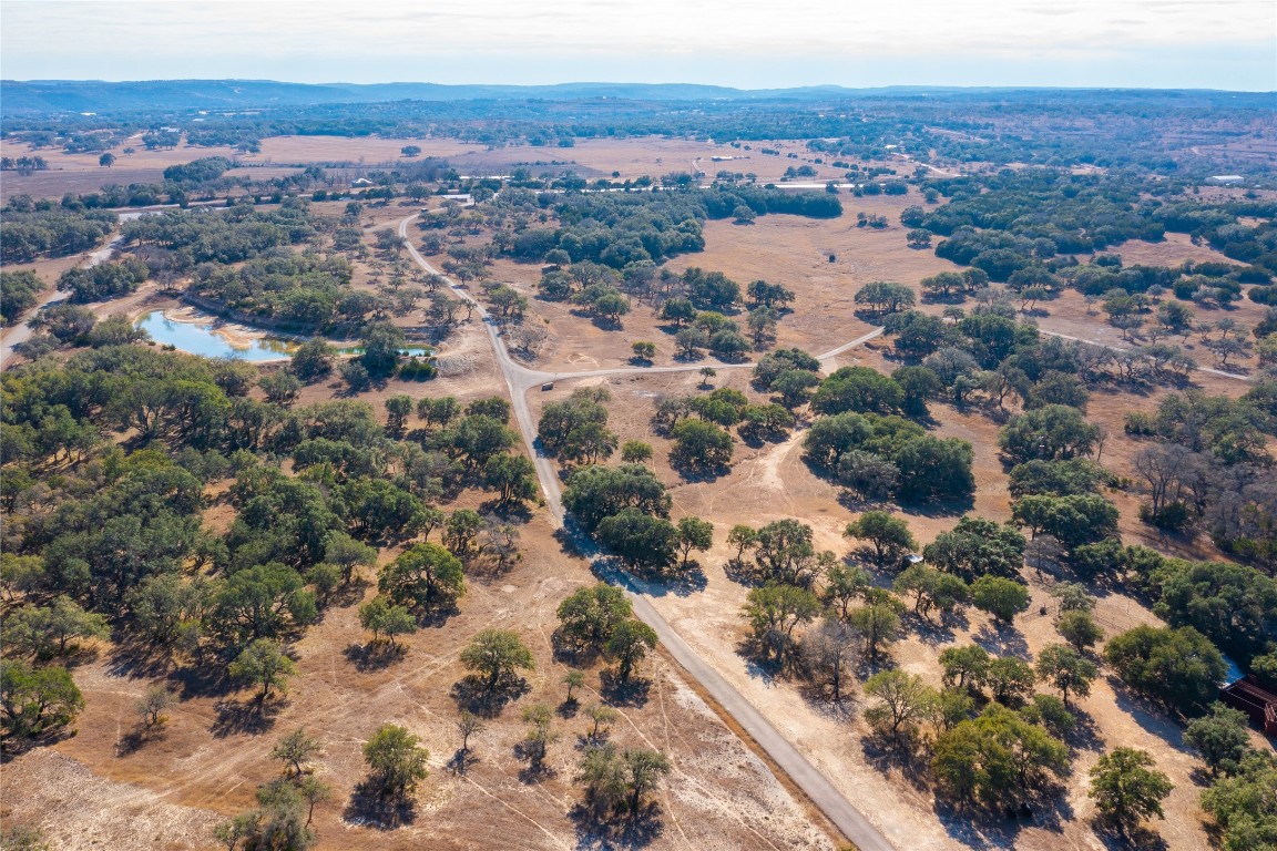 an aerial view of residential house and lake view