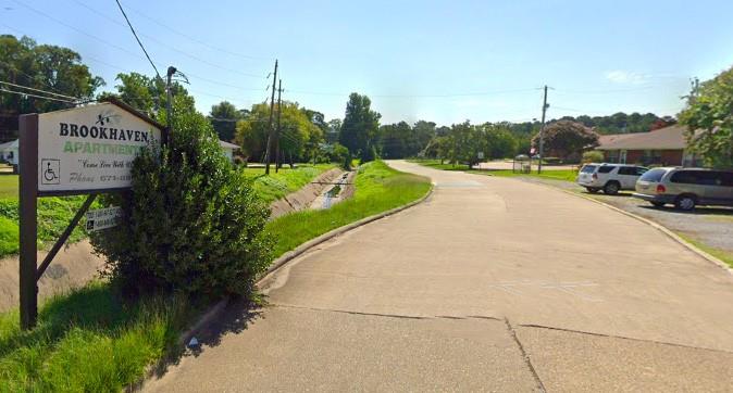 a view of a street with houses