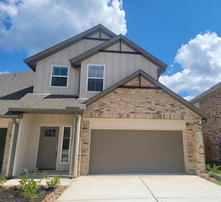 a view of a house with a garage