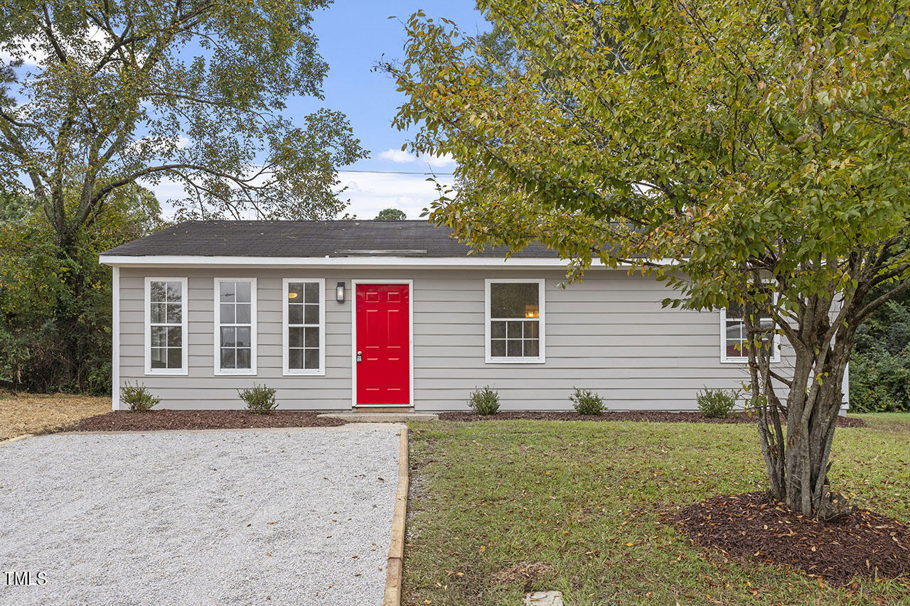 a front view of house with yard