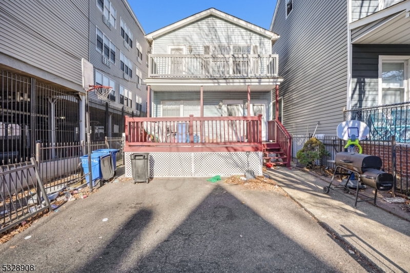 a view of a building with a porch