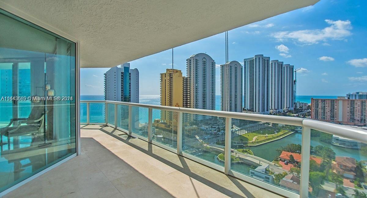 a view of balcony with furniture