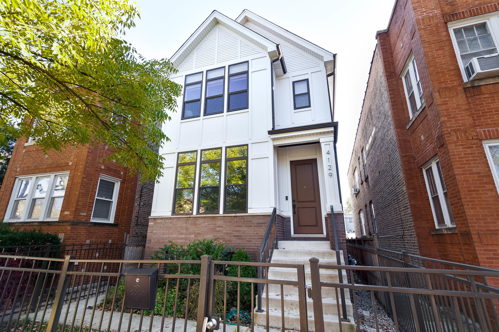 a front view of a house with balcony