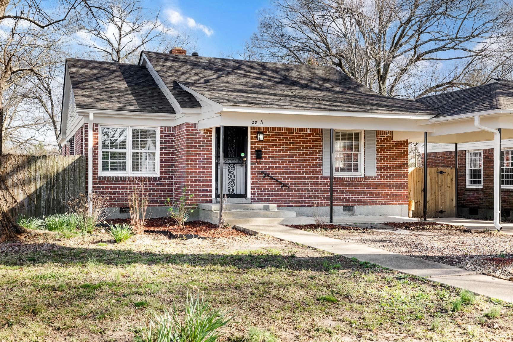 View of front of house with a front lawn