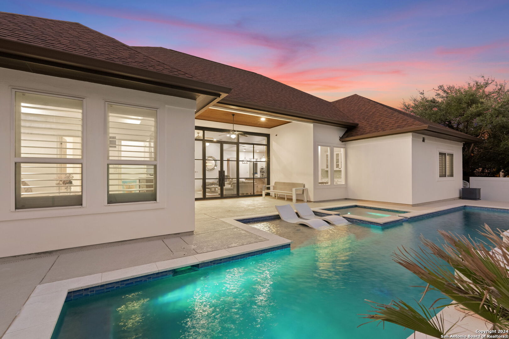 a backyard of a house with seating space