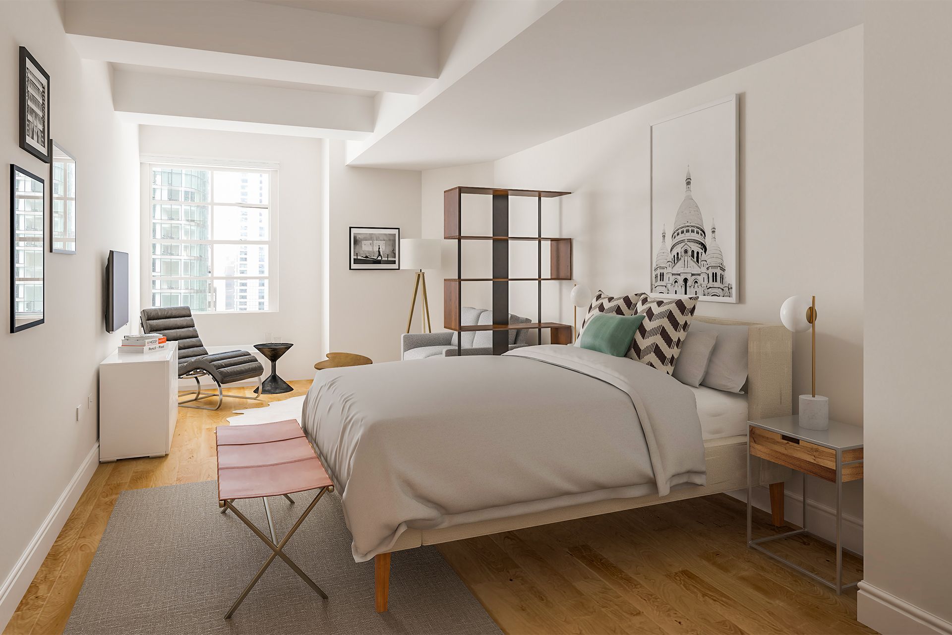 a bedroom with a bed and wooden floor