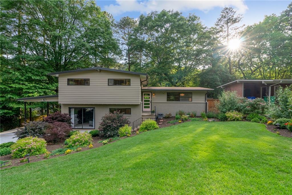 a house view with a garden space