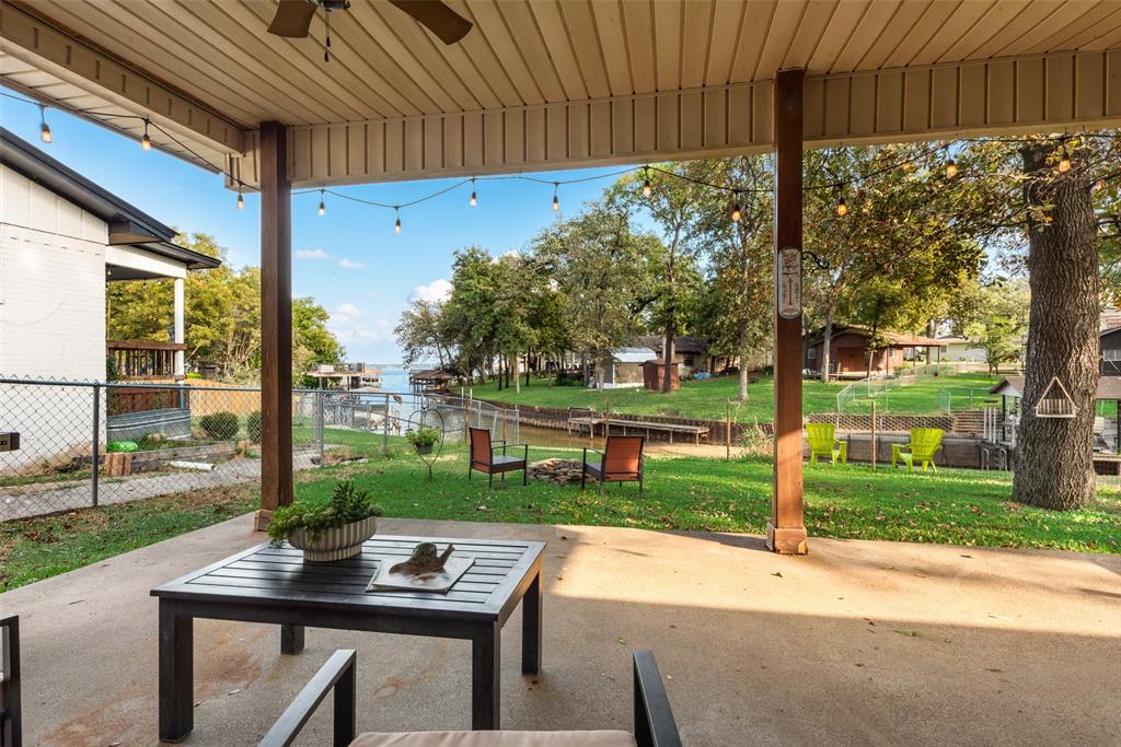 a view of yard with patio