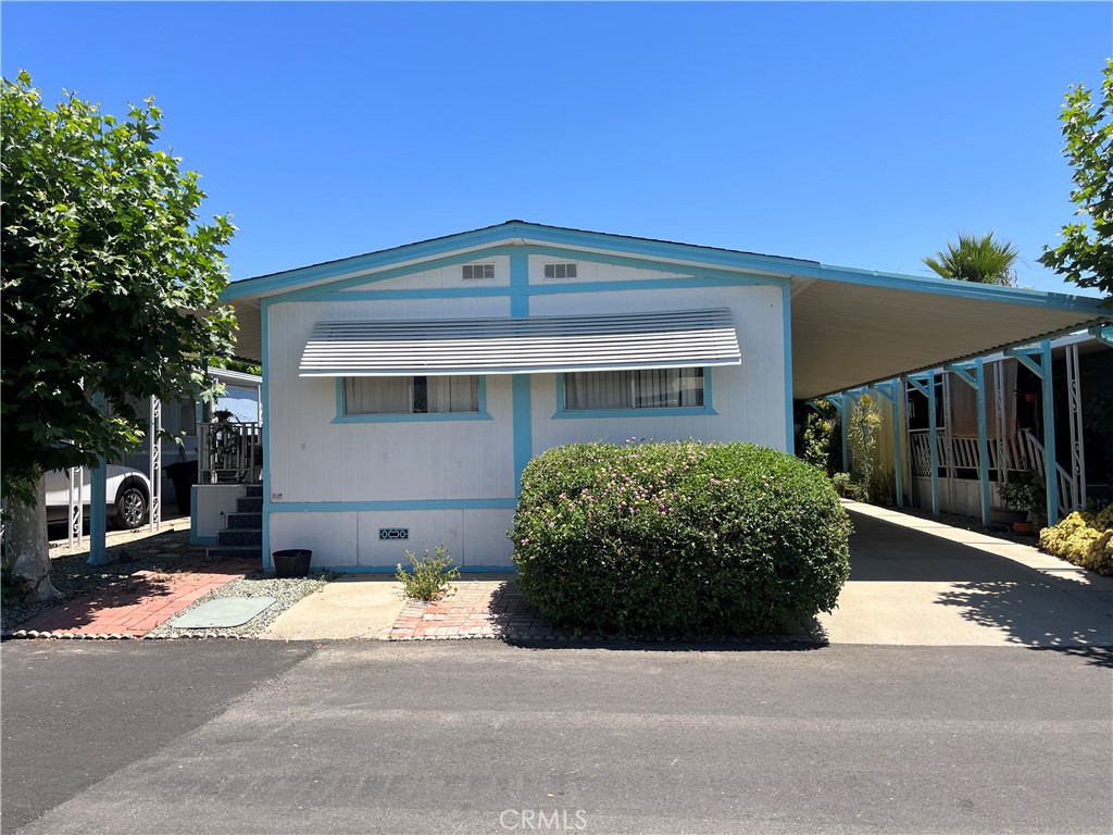 a front view of a house with a garage