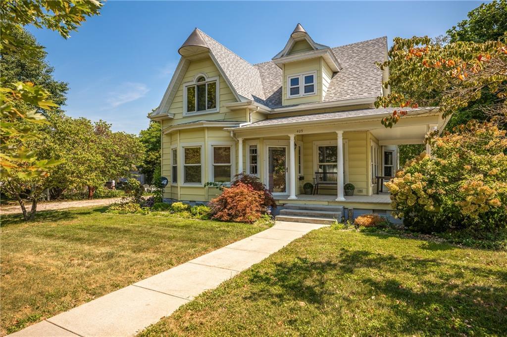 front view of a house with a yard