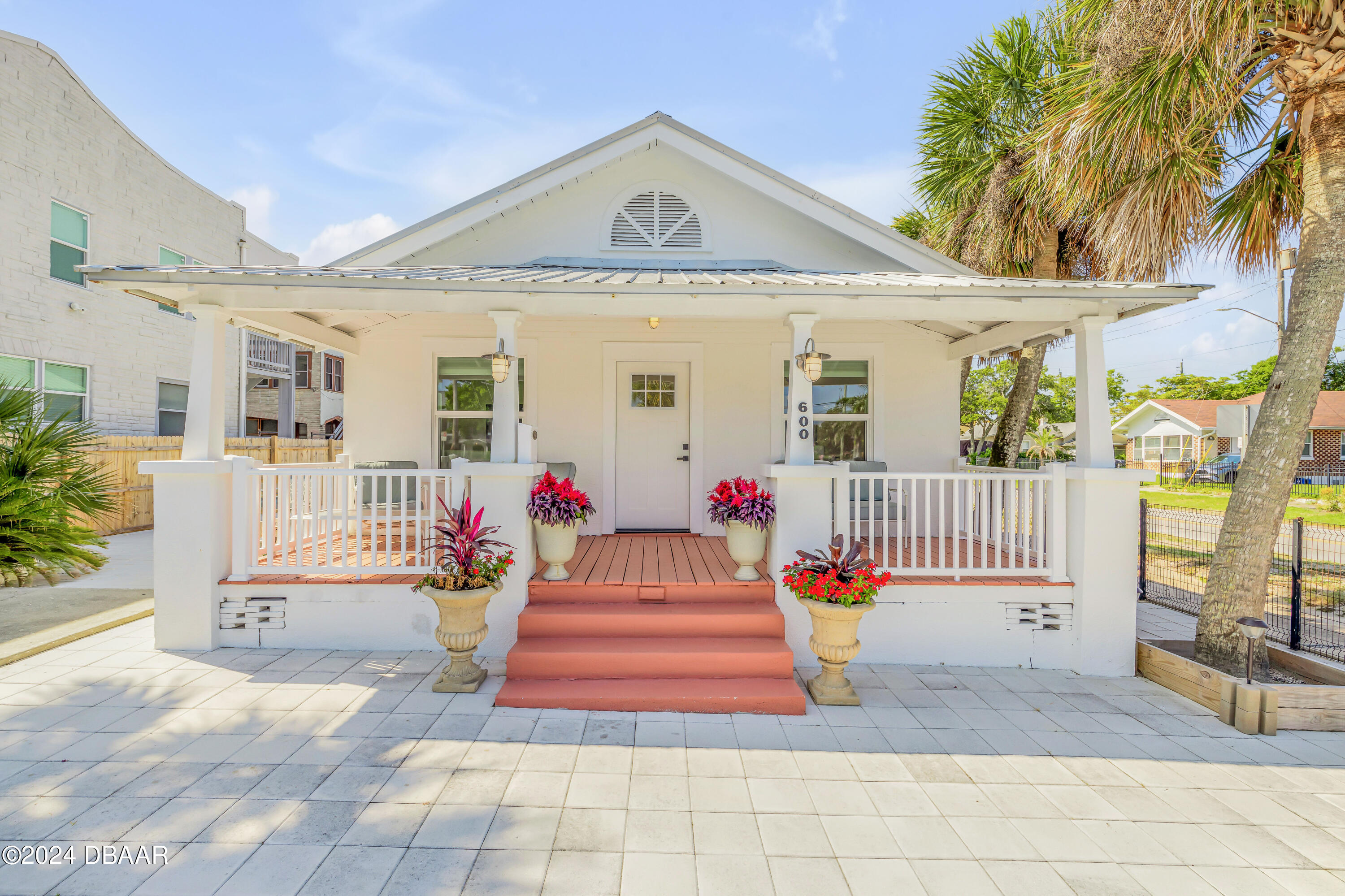 a front view of a house with a porch