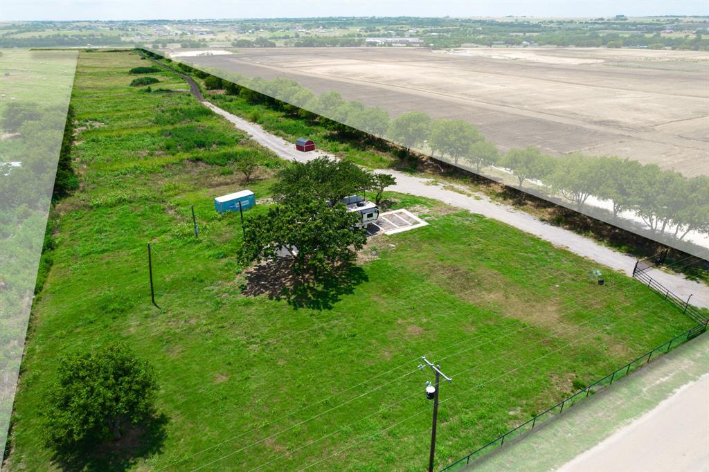 a view of an ocean and a yard