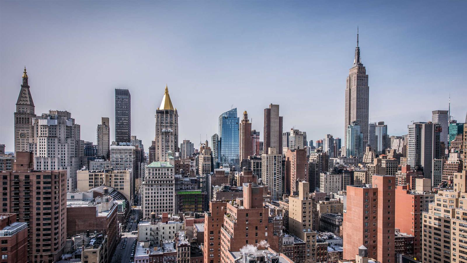 a view of a city with tall buildings