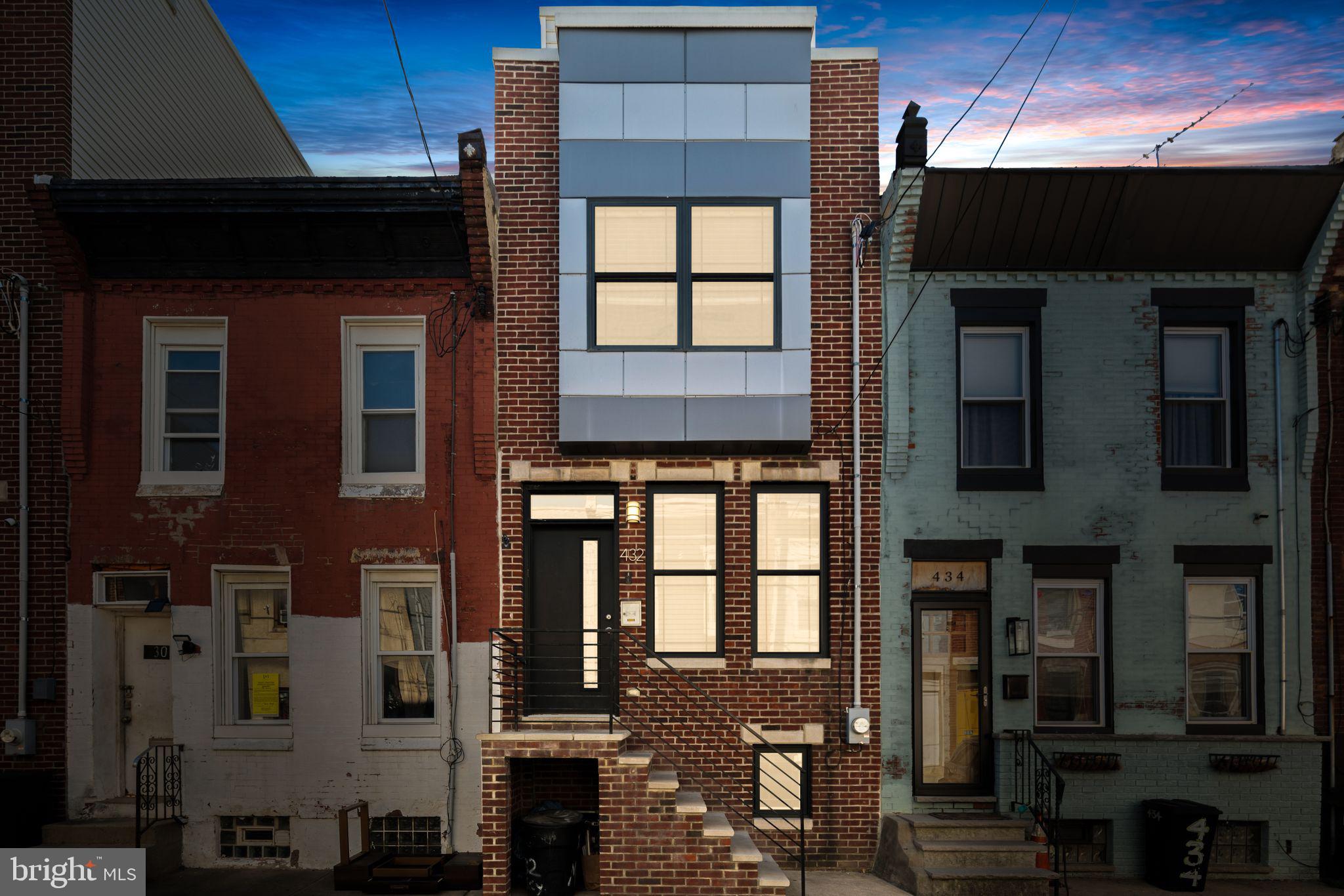 a front view of a building with a glass door