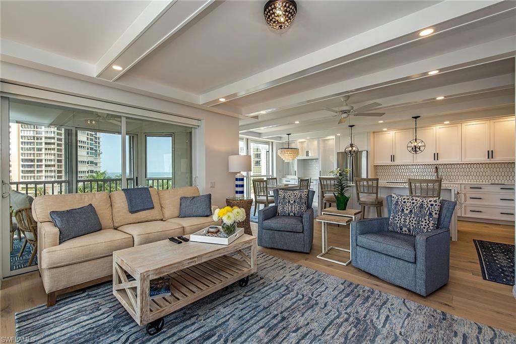 a living room with furniture and a table