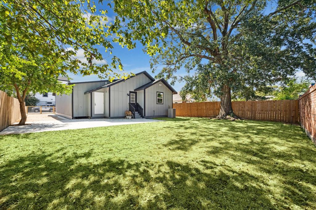 a house view with a garden space