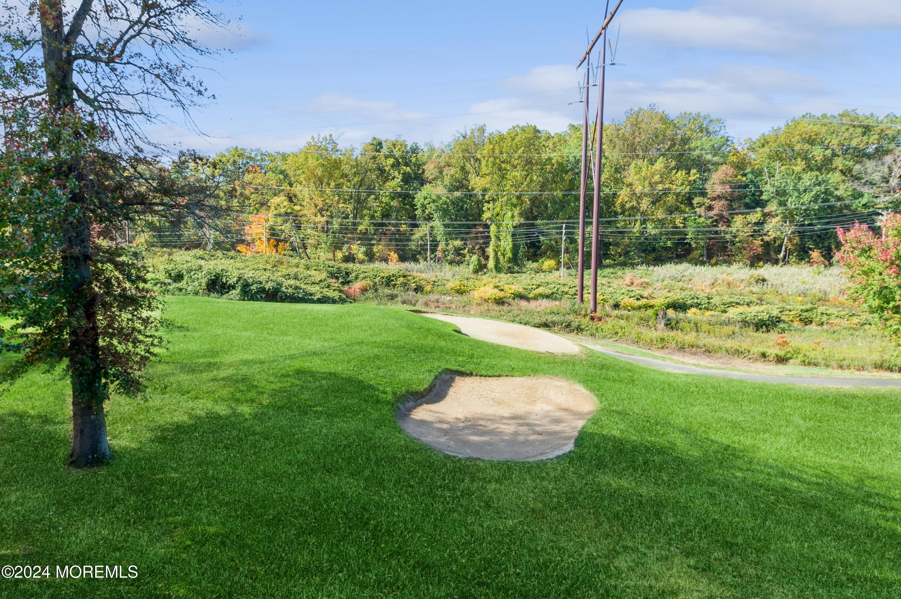 a view of a park with a slide