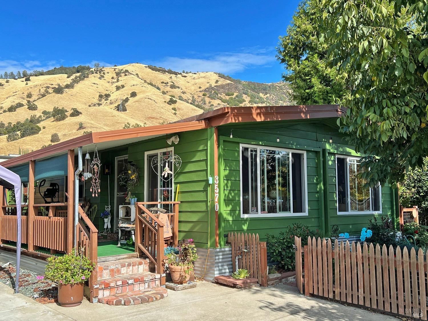 a front view of a house with a porch