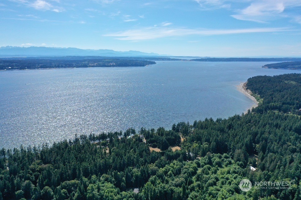 a view of a lake and mountain in the back