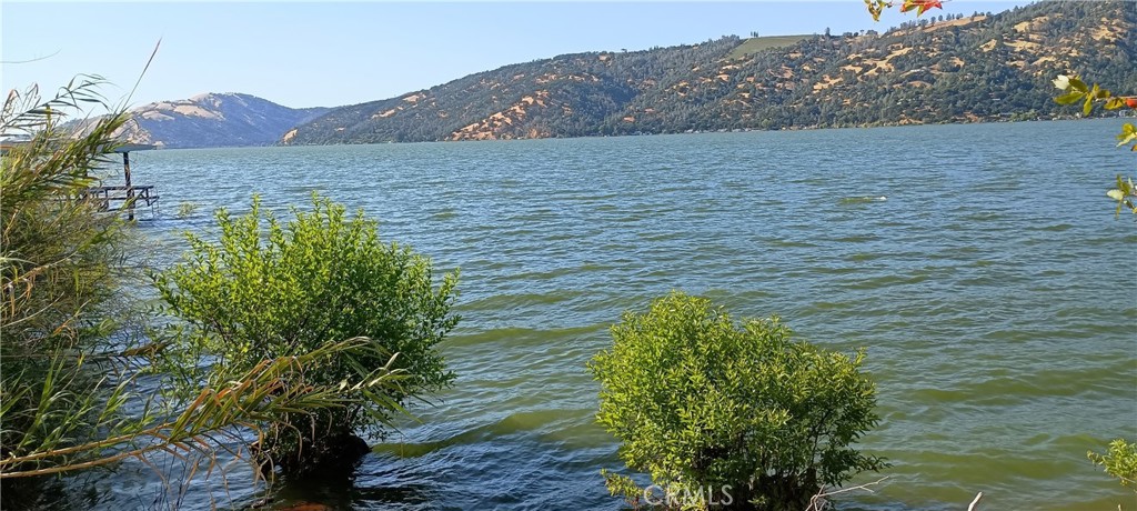 a view of a lake with a mountain in the background