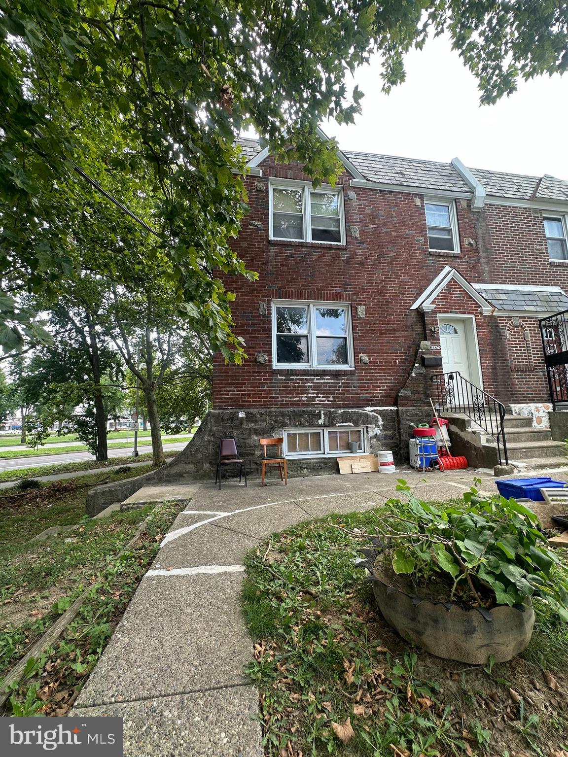 front view of a house with a yard